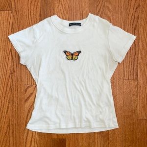 White cropped fitted shirt, Brandy Melville, orange butterfly design